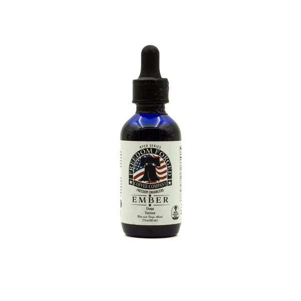 Bottle of Ember mushroom tincture with a dropper on a white background