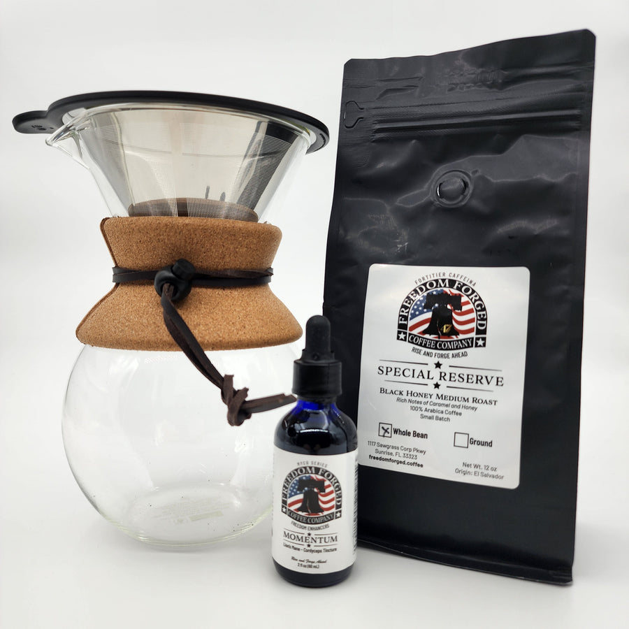 Coffee brewing equipment with a Special Reserve coffee bag and a bottle of Momentum mushroom tincture on a white background