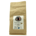 Brown coffee bag with a label on a white background