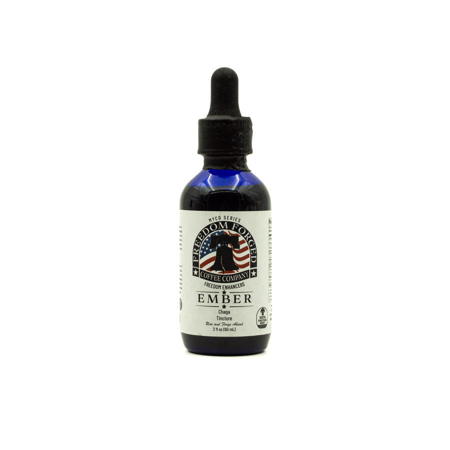 Bottle of Ember mushroom tincture  with a dropper on a white background