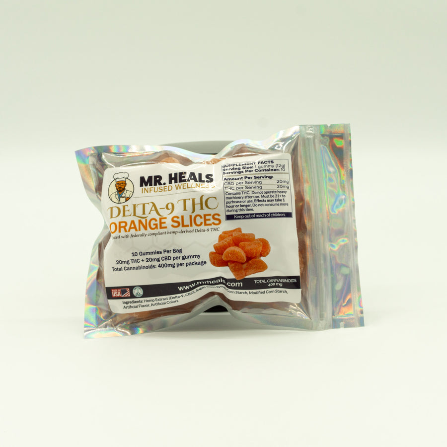 Packaged product labeled 'Mr. Heals' with orange slices on a white background