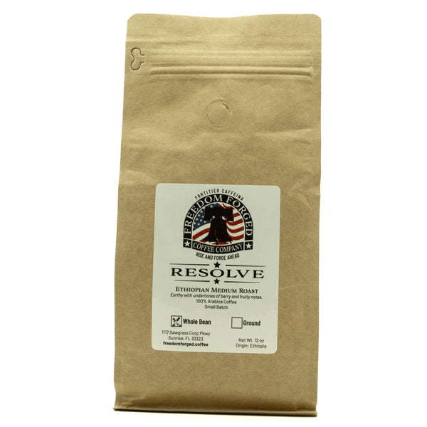 Kraft paper coffee bag with a label on a white background