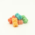 Colorful gummy bears on a white background