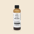 Mr. Heals Delta-9 THC BBQ Sauce, 4 fl oz bottle on parchment background