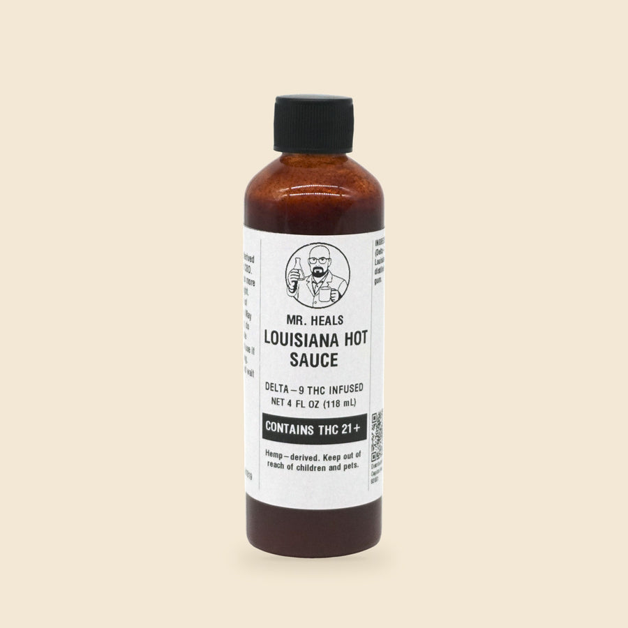 Mr. Heals Delta-9 THC Louisiana Hot Sauce, 4 fl oz bottle on parchment background